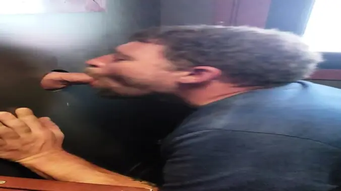 Wife watches husband suck a thick cock at the gloryhole